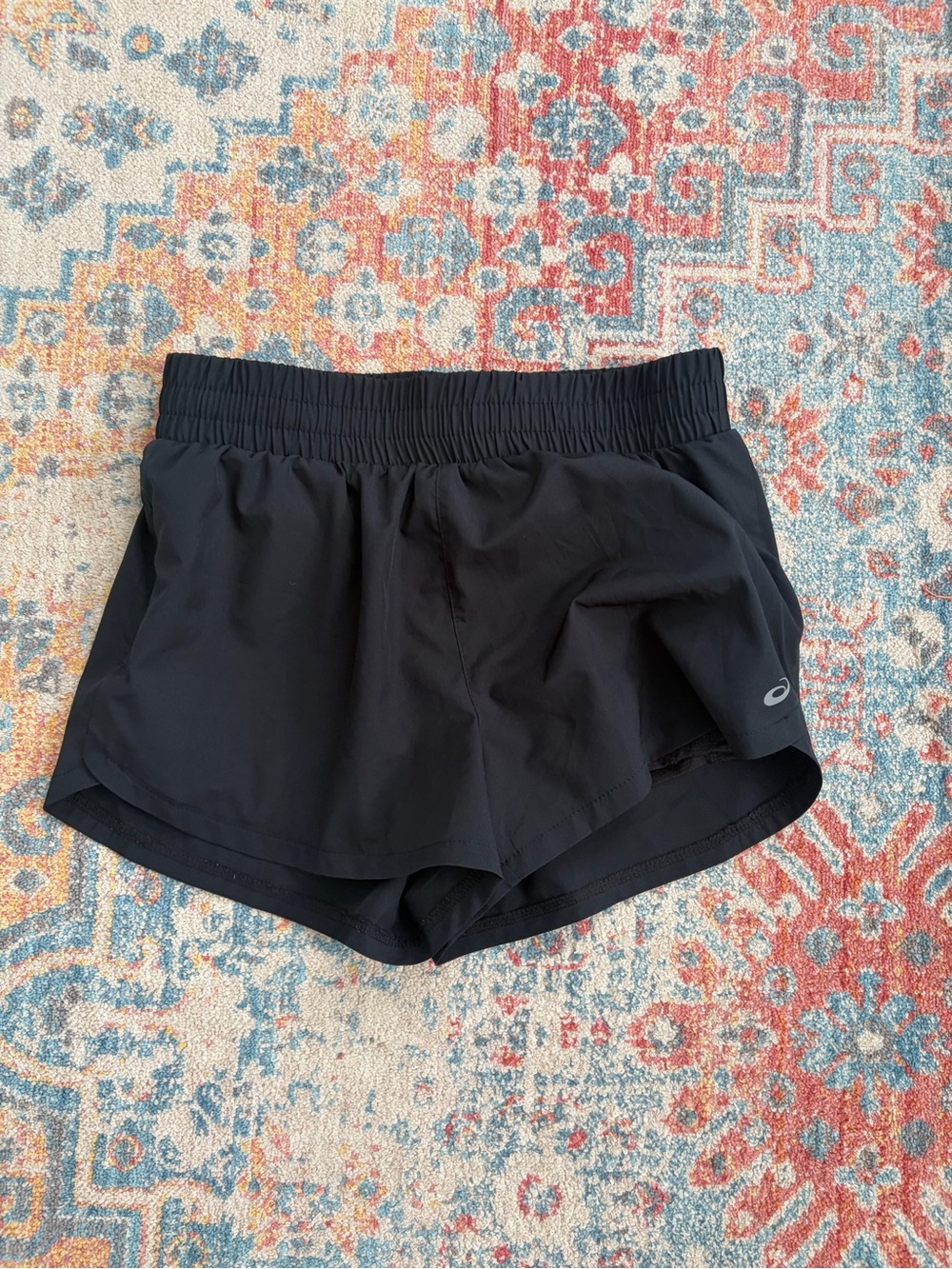 ASICS black athletic running shorts